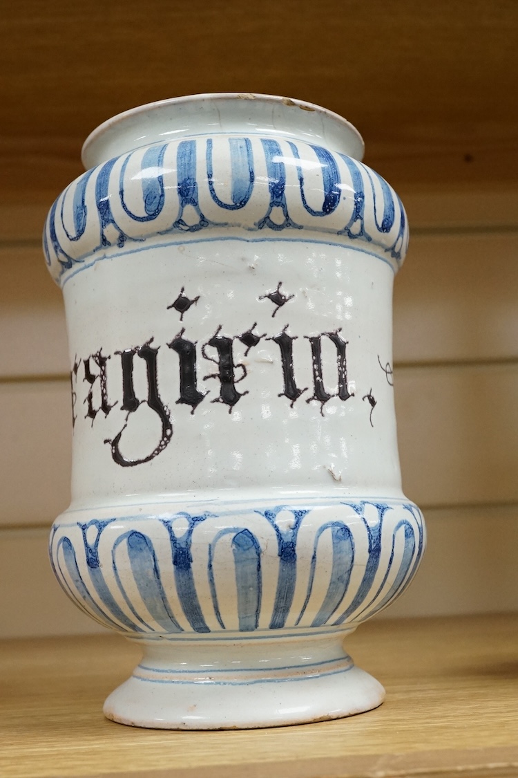 An 18th century Savona maiolica Albarello, inscribed in Manganese; ‘V. litragirio’ (lead oxide), 19cm high
